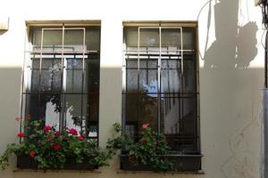 September 9, 2019. A window on the facade of a residential building in the city of Tel Aviv in Israel. photo