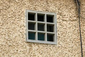 September 9, 2019. A window on the facade of a residential building in the city of Tel Aviv in Israel. photo