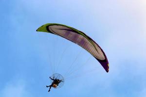 Paragliding in the sky over the Mediterranean Sea. photo