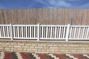 Fencing in a city park on the Mediterranean coast photo