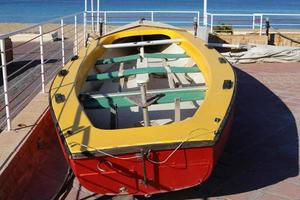 Berth for mooring boats and yachts on the seashore. photo