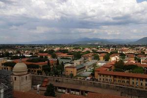 Pisa Italy May 8, 2022 Rooftops of the city of Pisa from the height of the Leaning Tower of Pisa. photo