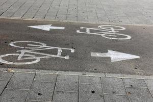 Sidewalk for pedestrians in a big city photo