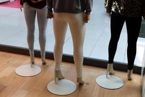 Tel Aviv Israel May 12, 2021. A mannequin stands on a window display in a store. photo