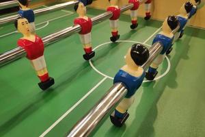 Close-up on the figures of a table football photo