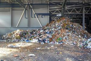 Modern waste recycling processing plant. Separate garbage collection. Recycling and storage of waste for further disposal. photo