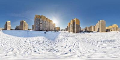 full  seamless spherical panorama 360 degrees angle view in high-rise building area urban development residential quarter in winter sunny day. 360 panorama in equirectangular projection. vr ar content photo