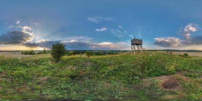 full seamless spherical panorama 360 by 180 degrees angle view on a high visibility mountain next to the old wooden fire tower in equirectangular projection, readyfor  VR AR virtual reality content photo