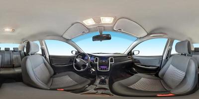 full seamless panorama 360 degrees angle view in interior fabric salon of prestige modern car in equirectangular equidistant spherical projection. skybox for vr ar content photo