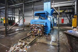 Separate garbage collection. Equipment for pressing debris sorting material to be processed in a modern waste recycling plant. photo