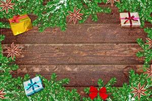 Winter background. Christmas composition with spruce branches and gifts. photo