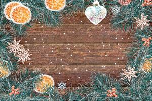 Winter background. Christmas composition with spruce branches and gifts. photo