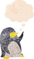 cartoon penguin and thought bubble in retro textured style vector