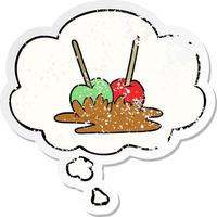 cartoon toffee apples and thought bubble as a distressed worn sticker vector