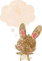 cute cartoon rabbit and thought bubble in retro textured style vector