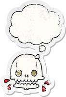 cartoon spooky skull and thought bubble as a distressed worn sticker vector