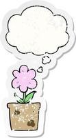 cute cartoon flower and thought bubble as a distressed worn sticker vector