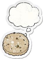 cartoon biscuit and thought bubble as a distressed worn sticker vector