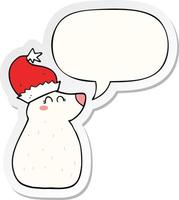 cartoon bear wearing christmas hat and speech bubble sticker vector