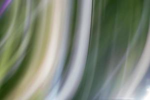 Wave background in shades of green. Abstraction, refraction of the world. photo