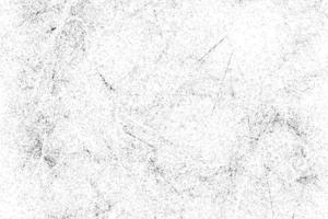 patrón de grunge blanco y negro. textura abstracta de partículas monocromáticas. fondo de grietas, rozaduras, astillas, manchas, manchas de tinta, líneas. superficie de fondo de diseño oscuro. foto