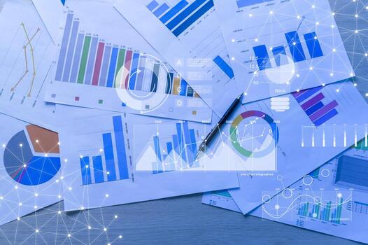 Background of documents with analytics data lying on table photo