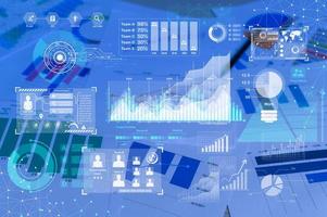 Background of documents with analytics data lying on table photo