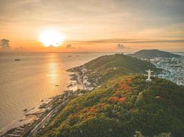 Top view of Vung Tau with statue of Jesus Christ on Mountain . the most popular local place. Christ the King, a statue of Jesus. Travel concept. photo