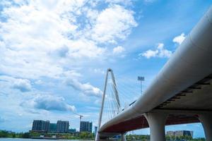 Ho Chi Minh city, Vietnam - MAY 22 2022 Thu Thiem 2 bridge, connecting Thu Thiem peninsula and District 1 across the Saigon River in Bach Dang port photo