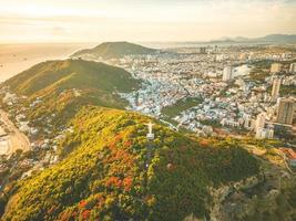 Top view of Vung Tau with statue of Jesus Christ on Mountain . the most popular local place. Christ the King, a statue of Jesus. Travel concept. photo