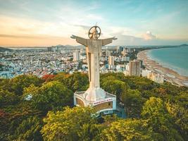 Top view of Vung Tau with statue of Jesus Christ on Mountain . the most popular local place. Christ the King, a statue of Jesus. Travel concept. photo