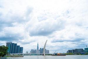 Ho Chi Minh city, Vietnam - MAY 22 2022 Thu Thiem 2 bridge, connecting Thu Thiem peninsula and District 1 across the Saigon River in Bach Dang port photo