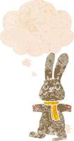 cartoon rabbit and thought bubble in retro textured style vector