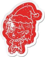 cute cartoon distressed sticker of a vampire girl wearing santa hat vector