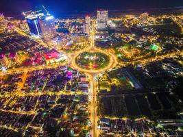 Vung Tau view from above, with traffic roundabout, house, Vietnam war memorial in Vietnam. Long exposure photography at night. photo