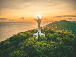 Top view of Vung Tau with statue of Jesus Christ on Mountain . the most popular local place. Christ the King, a statue of Jesus. Travel concept. photo