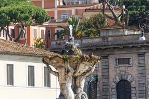 Rome, Italy, 2022 - Fountain and Temple of Vesta, Rome, Italy photo