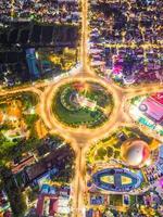 Vung Tau view from above, with traffic roundabout, house, Vietnam war memorial in Vietnam. Long exposure photography at night.