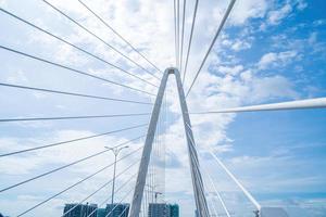 Ho Chi Minh city, Vietnam - MAY 22 2022 Thu Thiem 2 bridge, connecting Thu Thiem peninsula and District 1 across the Saigon River in Bach Dang port photo