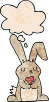 cartoon rabbit in love and thought bubble in grunge texture pattern style vector