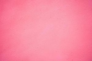Blank concrete wall pink color for texture background. New surface looks rough. Wallpaper shape. Backdrop texture wall and have copy space for text. Painted cement Surface design banners photo