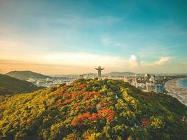 Top view of Vung Tau with statue of Jesus Christ on Mountain . the most popular local place. Christ the King, a statue of Jesus. Travel concept. photo