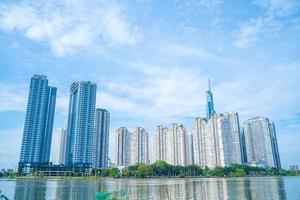 Ho Chi Minh city, VIETNAM - 12 FEB 2022 Beautiful blue sky view at Landmark 81 is a super tall skyscraper in center Ho Chi Minh City, Vietnam and Saigon bridge with development buildings photo