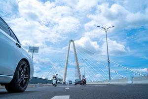 Ho Chi Minh city, Vietnam - MAY 22 2022 Thu Thiem 2 bridge, connecting Thu Thiem peninsula and District 1 across the Saigon River in Bach Dang port photo