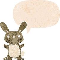 cute cartoon rabbit and speech bubble in retro textured style vector