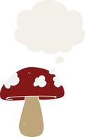 cartoon mushroom and thought bubble in retro style vector