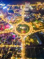 Vung Tau view from above, with traffic roundabout, house, Vietnam war memorial in Vietnam. Long exposure photography at night. photo
