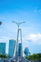 Ho Chi Minh city, Vietnam - MAY 22 2022 Thu Thiem 2 bridge, connecting Thu Thiem peninsula and District 1 across the Saigon River in Bach Dang port photo