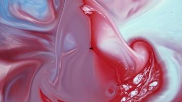 sfondo di inchiostro colorato. astratto colorato vernice inchiostro liquido esplodere diffusione esplosione psichedelica movimento video