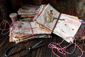 Christmas letters to Santa Claus wrapped in string photo